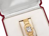 an image of a cartier watch in a box on a white surface