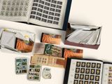a lot of stamps and stamps in a book on the table