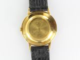 an image of a close up of a wrist watch on a white surface