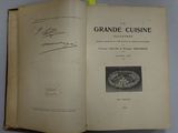 an open book with a picture of a plate of food on it