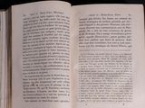 an open book that is sitting on a table