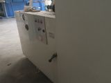 a machine that is sitting inside of a building