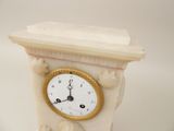 a clock that is sitting on a table