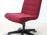 an image of a red office chair sitting on top of a black base