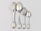 four silver spoons and a fork on a white surface