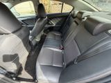 the back seats of a car are empty with no one in it