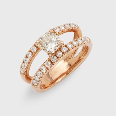 a close up of a diamond ring on a white background