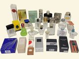 many different types of perfumes on the table