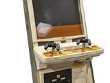 une petite console de jeux vidéo sur laquelle est installé un jeu vidéo