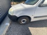 a white van that is parked in a parking lot