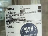 a picture of a visa card hanging on a glass door