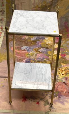a marble table with two shelves on it in a room