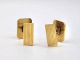 pair of gold plated stud earrings with a curved design