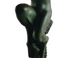 statue of a woman holding a cell phone to her ear