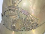 a close up of a helmet with a coat of arms on it