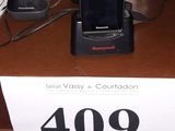 a picture of a cell phone on a desk with a price tag