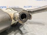 a close up of a exhaust pipe on a car with a blue background