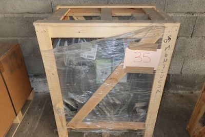 a picture of a wooden box with a plastic cover on it