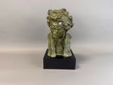 bronze sculpture of a man with a beard on a black base