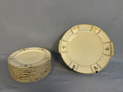 two plates and a bowl are stacked on top of each other