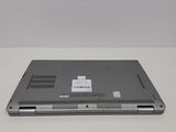 a laptop that is sitting on a white table