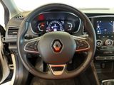 the interior of a car with a steering wheel and dashboard controls