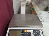 a scale that is sitting on a counter in a store