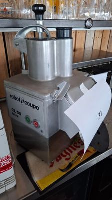 a silver blender sitting on top of a counter