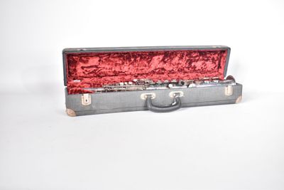 a silver case with a red lining on it