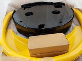 a box with a yellow and black object inside of it