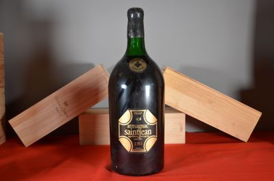a bottle of wine that is sitting on a table