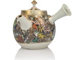 an image of a tea pot with a bird on it