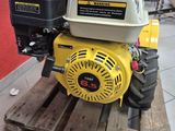an image of a small engine on a pallet