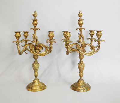 pair of antique brass candelabs with birds and flowers