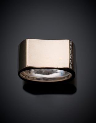 an image of a close up of a ring on a black surface