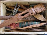 a wooden box filled with different types of tools