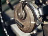 a close up of the steering wheel of a vintage car