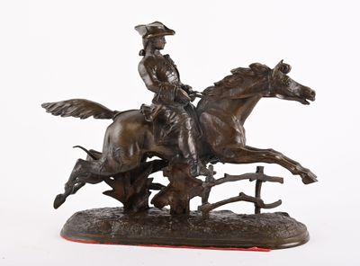 statue représentant un homme à cheval, avec un chien qui court derrière lui