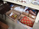 a table with a lot of boxes of items on it