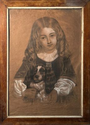 portrait of a young girl with a dog in her lap