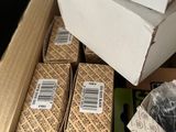a box of assorted items sitting on the floor
