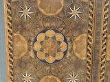 a cabinet that has a star design on it