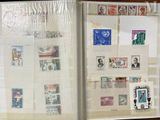 a picture of an open book with stamps on it