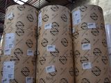many rolls of paper that are stacked on top of each other