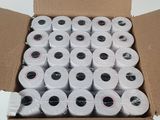 many rolls of toilet paper in a cardboard box