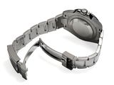 a watch that is sitting on a bracelet on a white surface