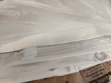a pile of plastic bags sitting on top of a wooden table