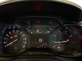a close up of a car dashboard with a speedometer and gauges