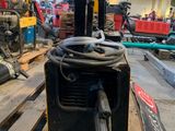 a picture of a fork lift in a warehouse