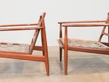 pair of mid - century danish teak lounge chairs